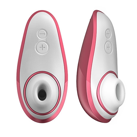 Стимулятор клитора "Womanizer Liberty" коралловый 